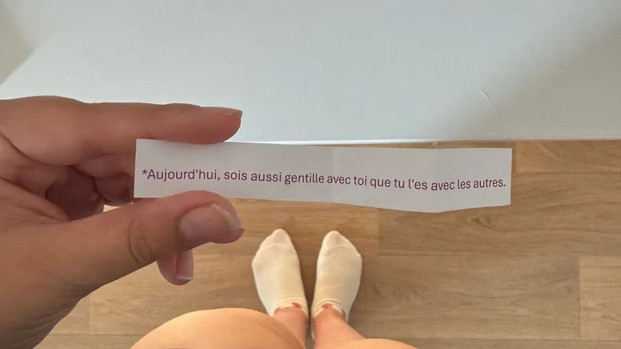 Paper slip: 'today, be as kind to yourself as to others'