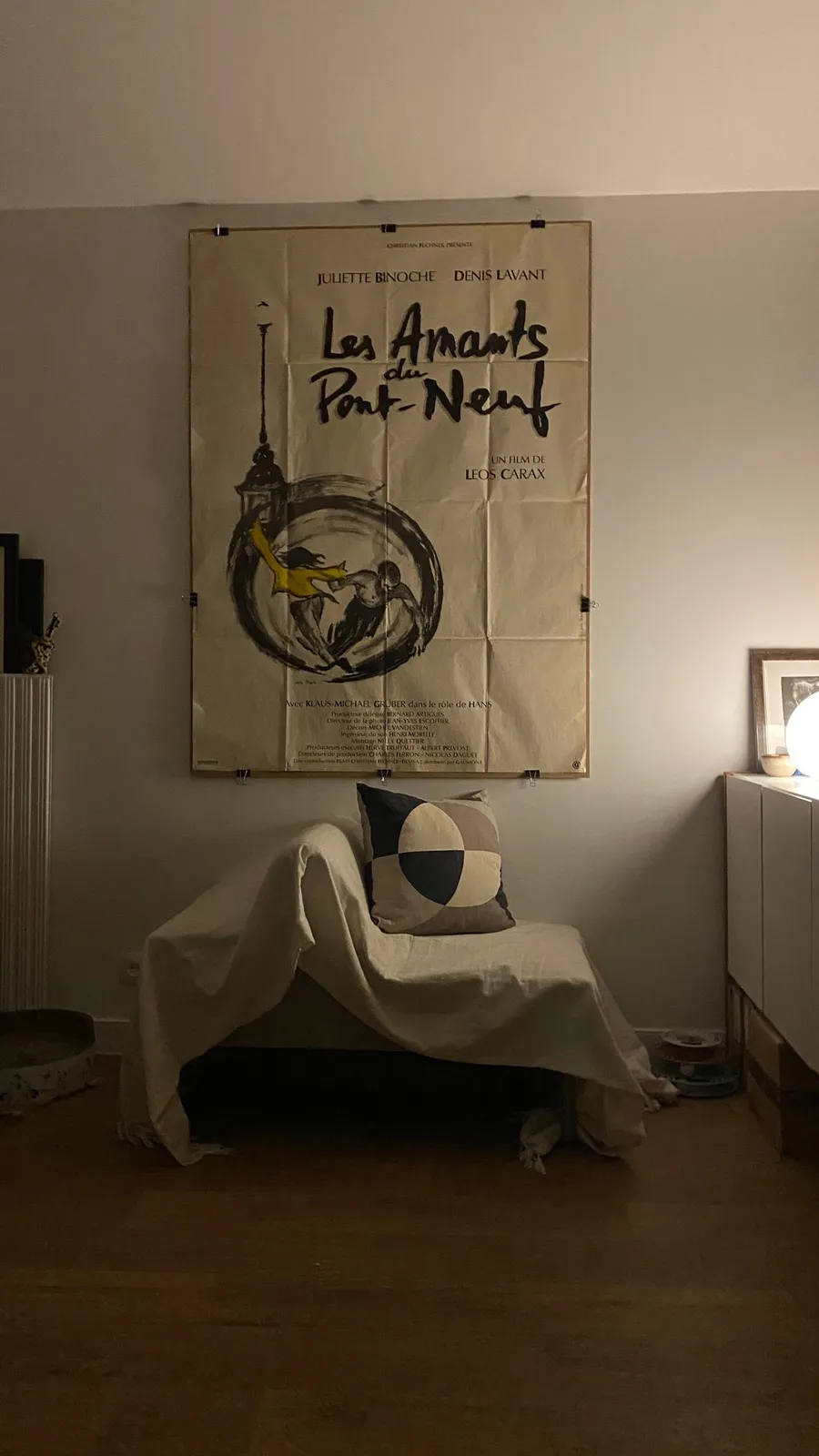 Dim room, Amants du Pont-Neuf poster now framed on the wall