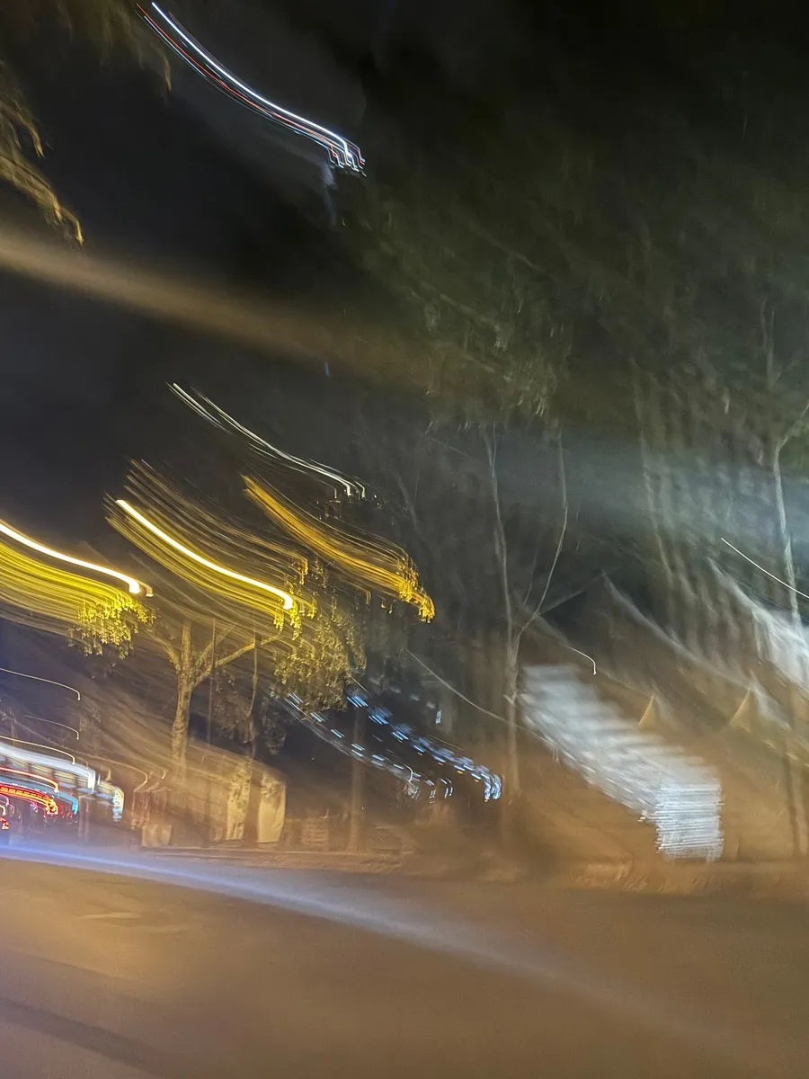 Streaks of city light at night, motion blur