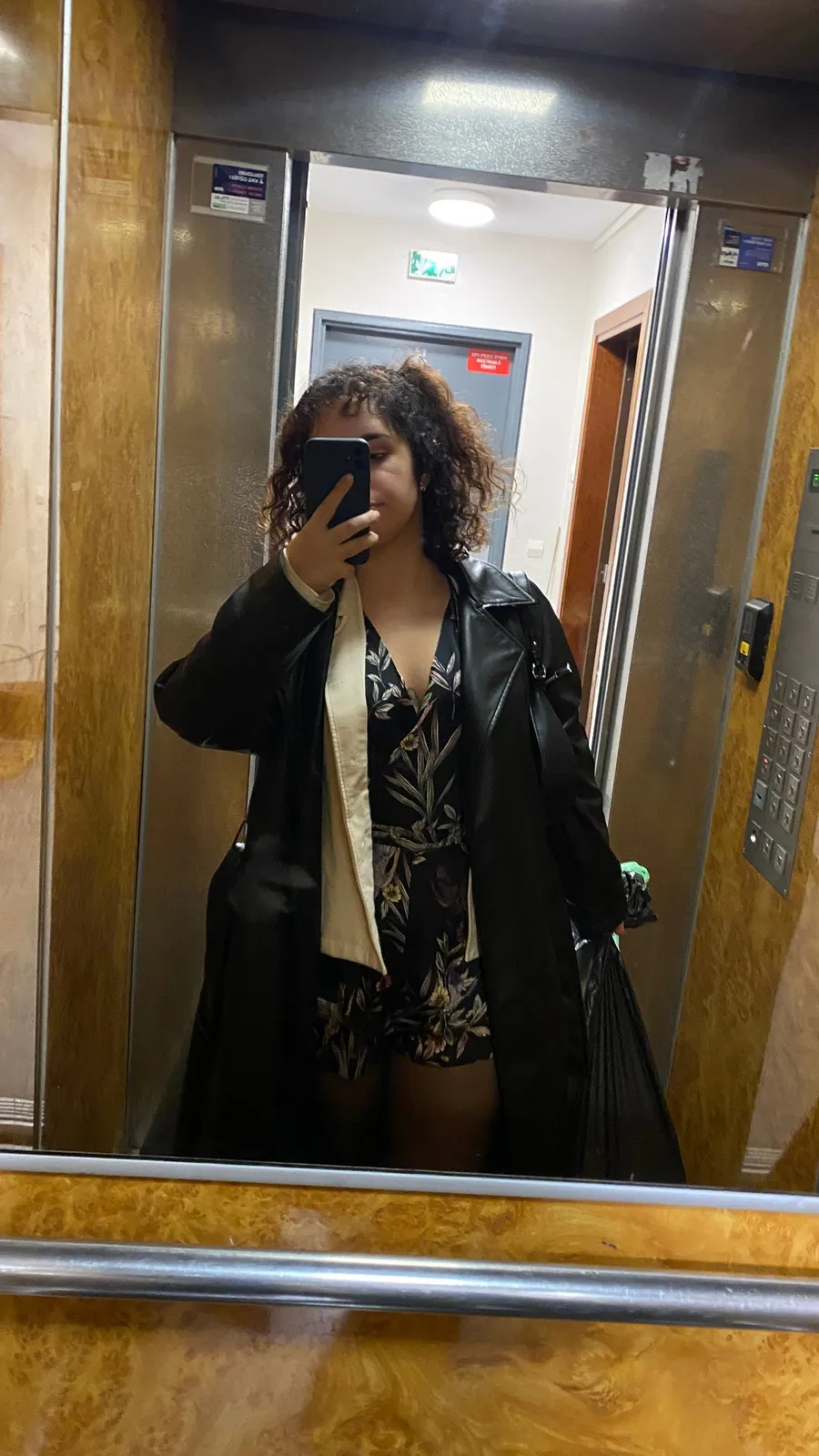 Lift mirror selfie, slip dress under leather coat