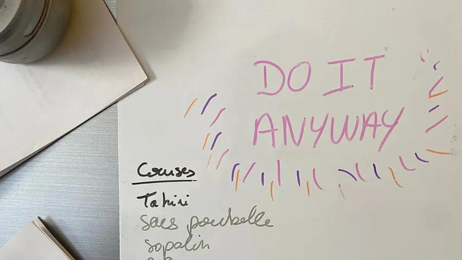 Note 'DO IT ANYWAY' in pink above a shopping list (tahini)