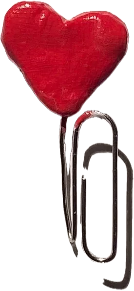Red clay heart on a paperclip