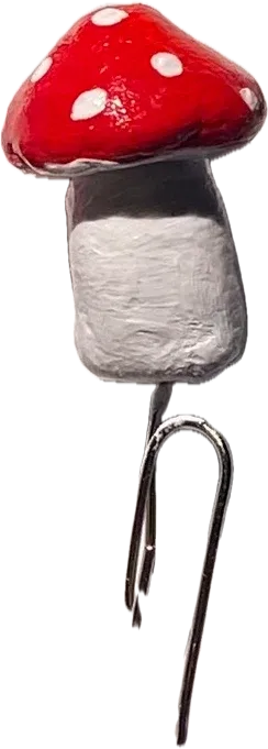 Red mushroom on a paperclip