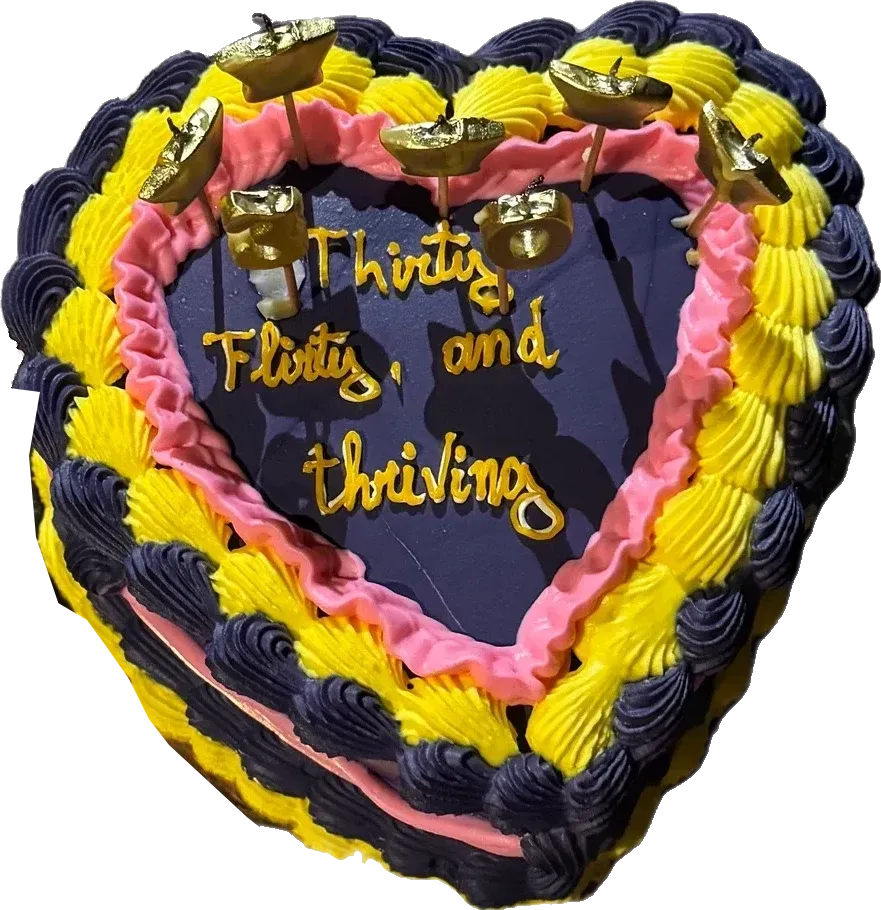 Heart-shaped navy cake: thirty, flirty and thriving